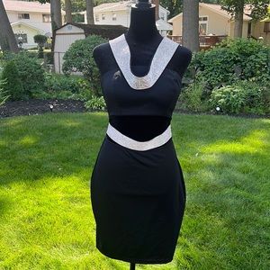 Bling and Black Little black party dress!! Size M by Fashion Nova!